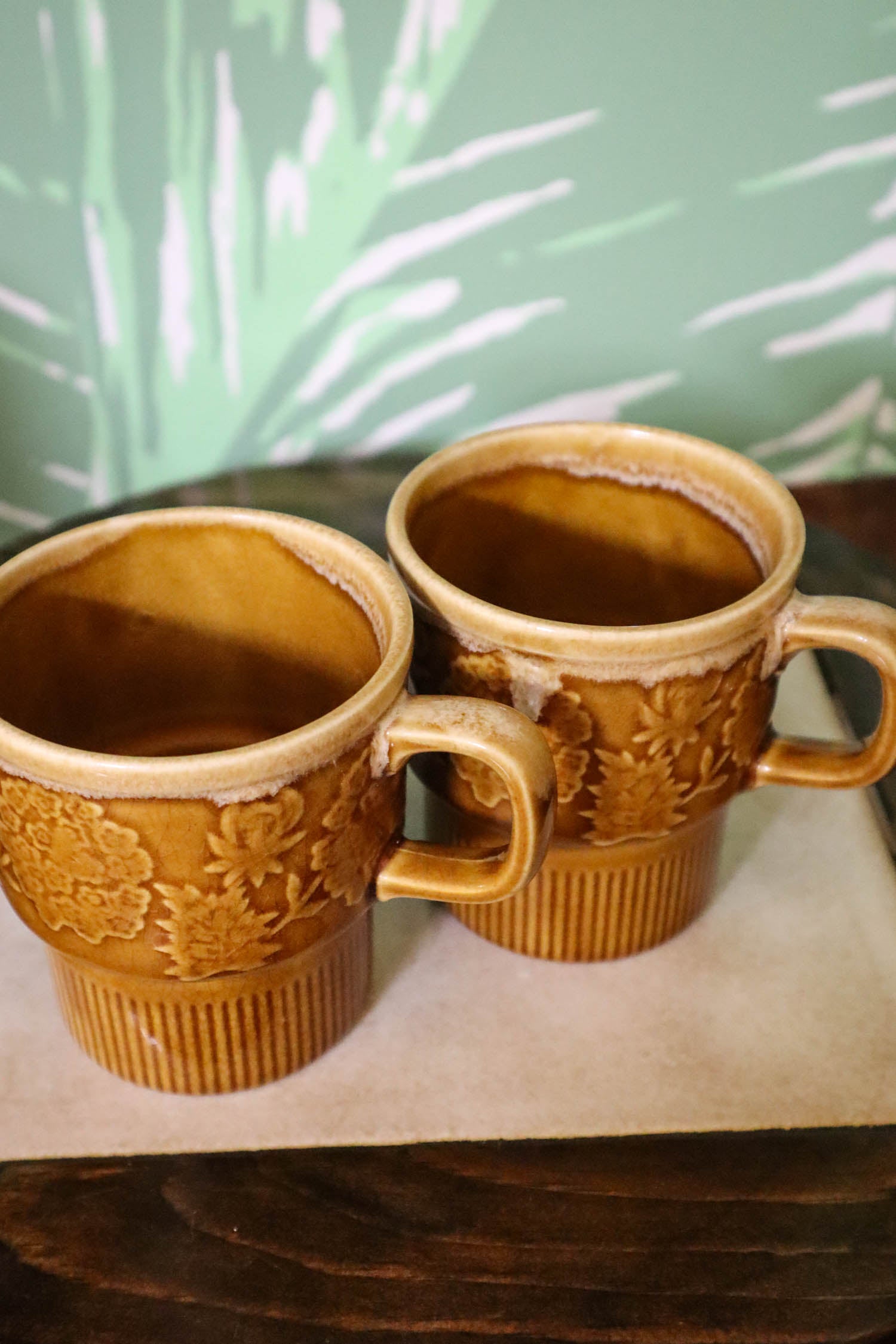 https://justdandies.co/cdn/shop/files/2606-vintage-mcm-drip-glaze-coffee-mugs-japan-3.jpg?v=1695845385&width=1946